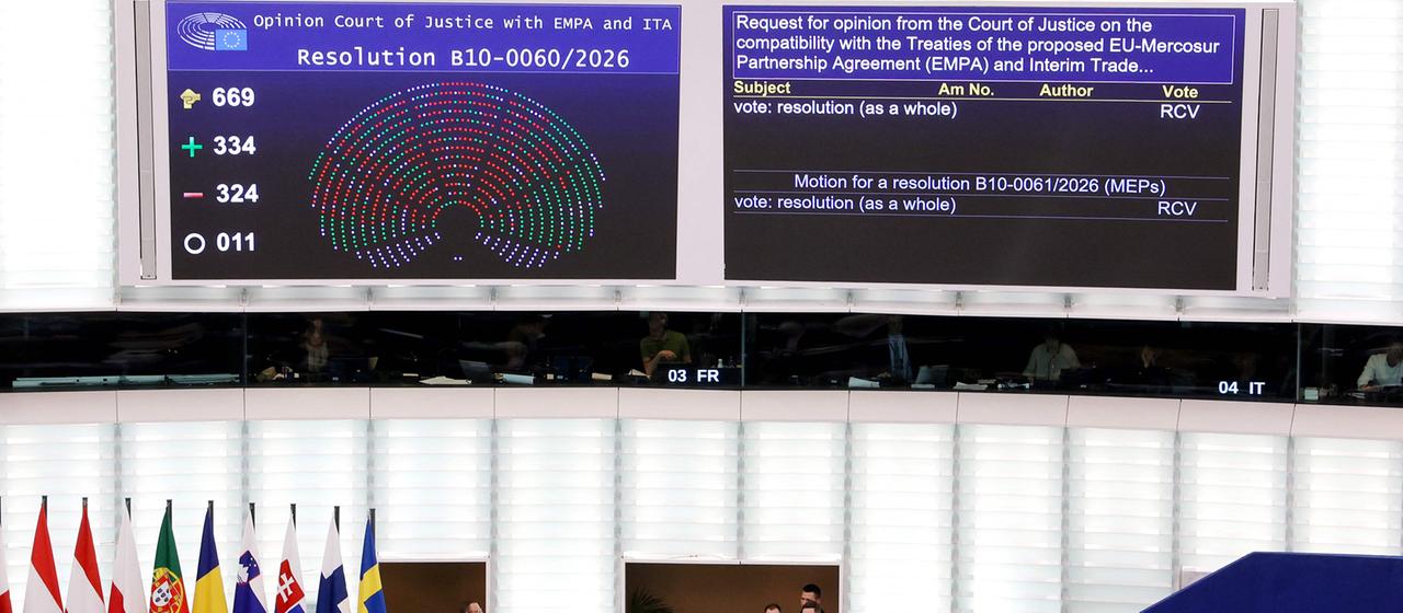 Screens displaying the results of the vote on the legal transfer of the Mercosur agreement at the European Parliament in Strasbourg, eastern France. 