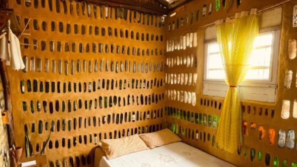 They collected 8,000 glass bottles over two years and ended up building a seven-room house - This is how they managed to build walls with thousands of glass bottles