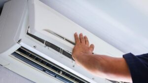 The air conditioning paradox: it cools your house, but it also contributes to global warming